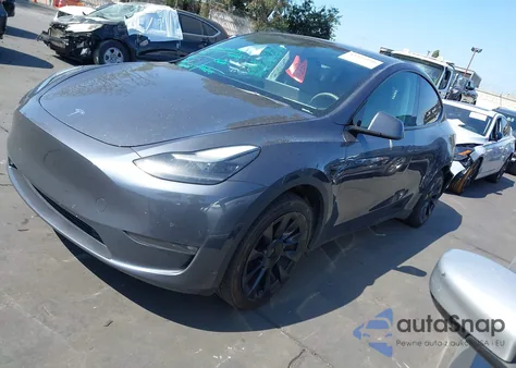 2022 Tesla Model Y Long Range Dual Motor All-Wheel Drive из США, поврежденный, VIN 7SAYGAEE7NF550199
